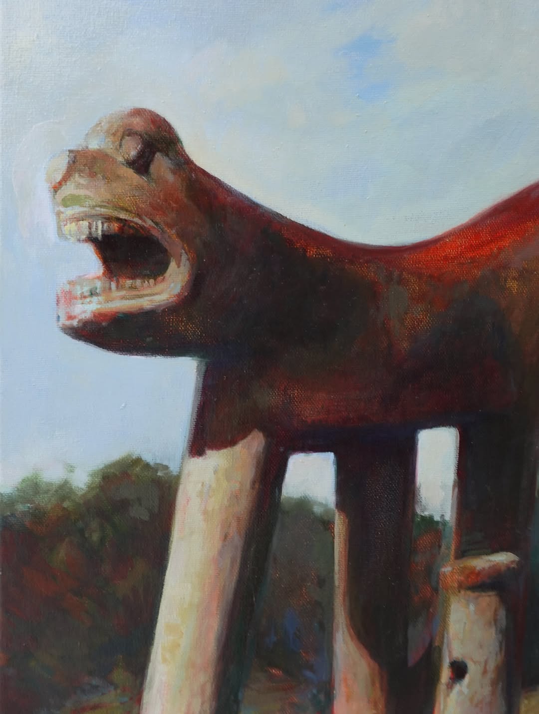 Mouth Monolith — beast-like structure on stilts with open mouth, against sky