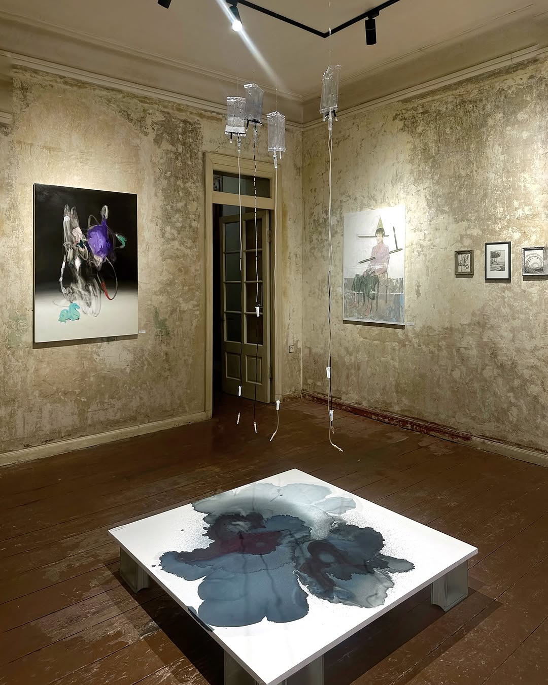 New Locality — installation view, old Tbilisi apartment with paintings and ink works